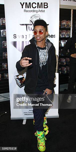 Rapper Christopher "Lil Twist" Moore attends a meet and greet at the Nikura Electronics booth during the 2013 International CES at the Las Vegas...