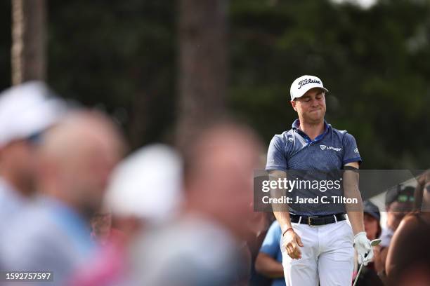 Justin Thomas of the United States reacts on the 16th tee during the second round of the Wyndham Championship at Sedgefield Country Club on August...