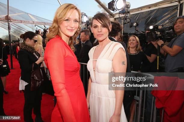 Actresses Kerry Bishe and Clea DuVall attend the 18th Annual Critics' Choice Movie Awards held at Barker Hangar on January 10, 2013 in Santa Monica,...