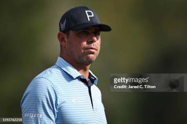 Gary Woodland of the United States looks on from the on the 15th green during the second round of the Wyndham Championship at Sedgefield Country Club...