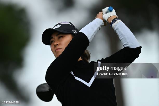 Player Danielle Kang plays a shot on the 12th tee on day 2 of the 2023 Women's British Open Golf Championship at Walton Heath Golf Club in...