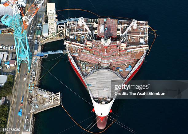 In this aerial image, an aquanautics vessel is under construction at Mitsubishi Heavy Industry Nagasaki Shipyard on January 9, 2013 in Nagasaki,...