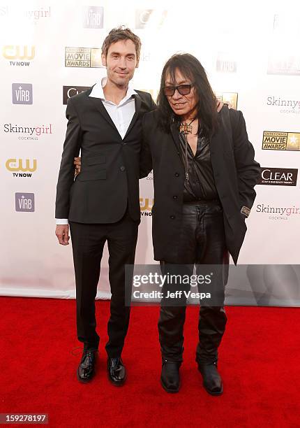 Director Malik Bendjelloul and Musician Sixto Rodriguez arrive at the 18th Annual Critics' Choice Movie Awards at The Barker Hangar on January 10,...