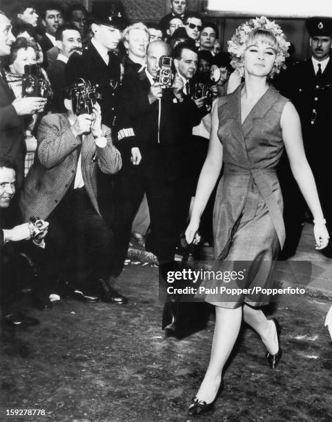 British former model and showgirl Mandy Rice-Davies leaves the Old Bailey, London, after giving evidence in the trial of Stephen Ward, July 1963....