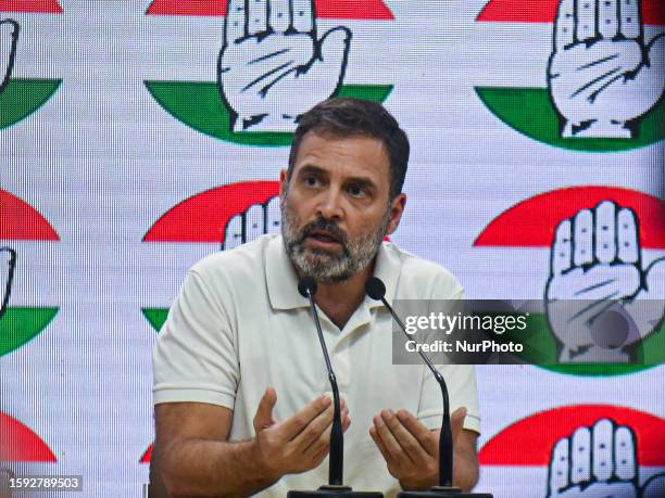 India's main opposition leader of the Indian National Congress party, Rahul Gandhi, gestures during a press conference at the party headquarters in...