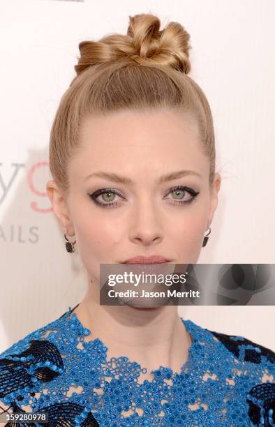 Actress Amanda Seyfried arrives at the 18th Annual Critics' Choice Movie Awards held at Barker Hangar on January 10, 2013 in Santa Monica, California.