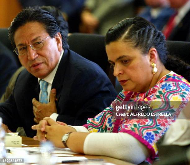 Peruvian President Alejandro Toledo is accompanied by Beatriz Paredes, president of the Mexican Chamber of Deputies, during a conference in the Union...