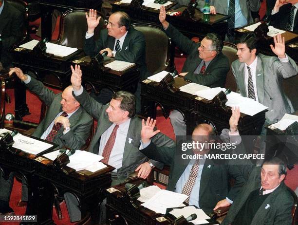 Government congressional deputees from the judiciary party in Argentina vote to postpone a law on Economic Subversion 22 May 2002 in Buenos Aires....