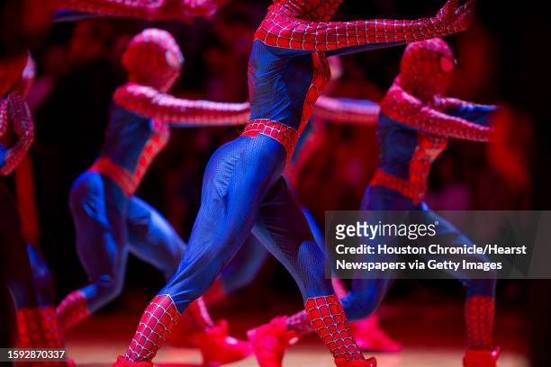 The Rockets Power Dancers perform dressed as Spider Man during the second half of the Rockets 104-85 loss to the Portland Trail Blazers, Tuesday,...