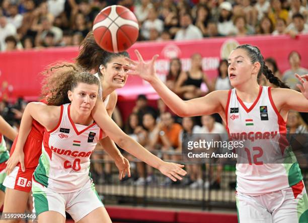 Seyma Yilik of Turkiye in action against Aliz Janzso of Hungary during the FIBA U16 Women's European Championship match between Turkiye and Hungary...