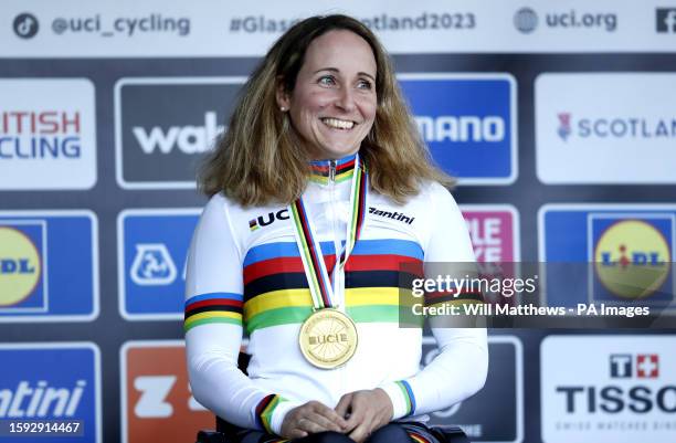 Germany's Annika Zeyen celebrates with the gold medal after victory in the Women H3 Road Race on day nine of the 2023 UCI Cycling World Championships...