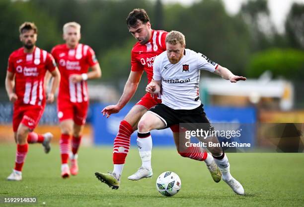 Louth , Ireland - 11 August 2023; Daryl Horgan of Dundalk in action against John Mahon of Sligo Rovers during the SSE Airtricity Men's Premier...