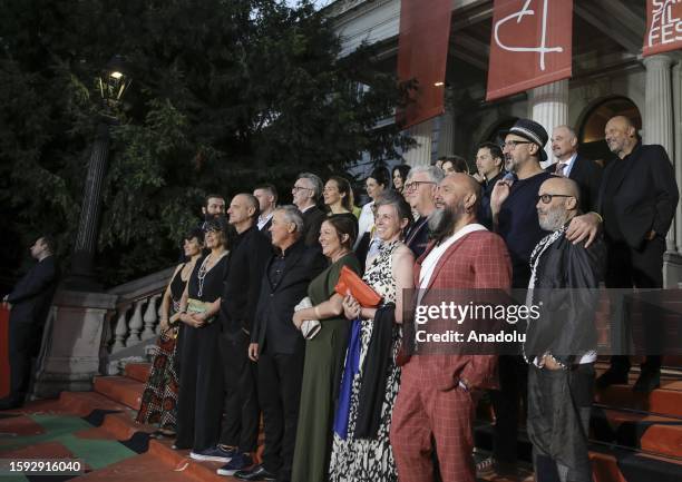 Big names of the film industry arrive at the red carpet area in front of Bosnian National Theater before the premiere of the motion picture 'Kiss The...