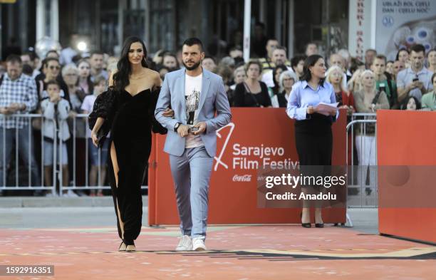 Big names of the film industry arrive at the red carpet area in front of Bosnian National Theater before the premiere of the motion picture 'Kiss The...