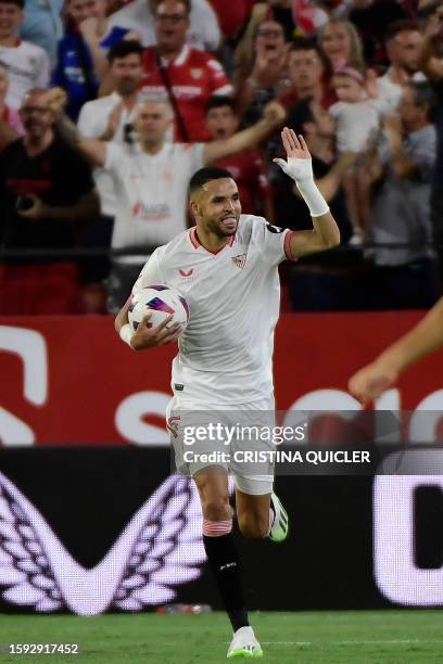 Sevilla's Moroccan forward Youssef En-Nesyri celebrates scoring his team's first goal during the Spanish Liga football match between Sevilla FC and...