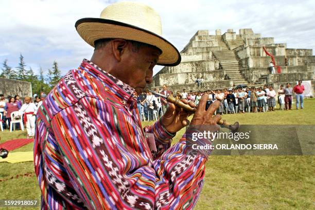 An indigenous leader plays an instrument call the chirimia during the inauguration of the Third Congress of Mayan Education at the Zaculeo center, in...