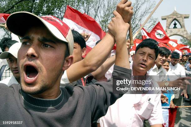 Activists of the Nepali Congress block a road in Kathmandu, 08 May 2003 as they protest against King Gyanendra's sacking of the elected prime...