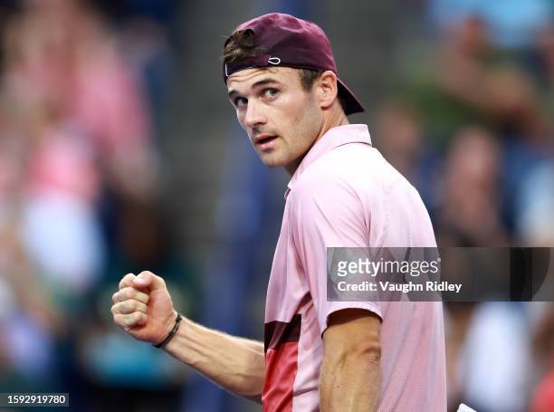 Tommy Paul of the United States reacts after winning the first set against Carlos Alcaraz of Spain during Day Five of the National Bank Open, part of...