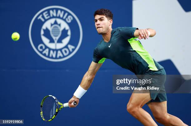 Carlos Alcaraz of Spain hits a shot against Tommy Paul of the United States during Day Five of the National Bank Open, part of the Hologic ATP Tour,...