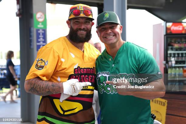 Jonny Gomes of the Steamed Cheeseburgers and Nick Swisher of the Bouncing Pickles pose during the HRDX Hartford at Dunkin Park on Friday, August 11,...