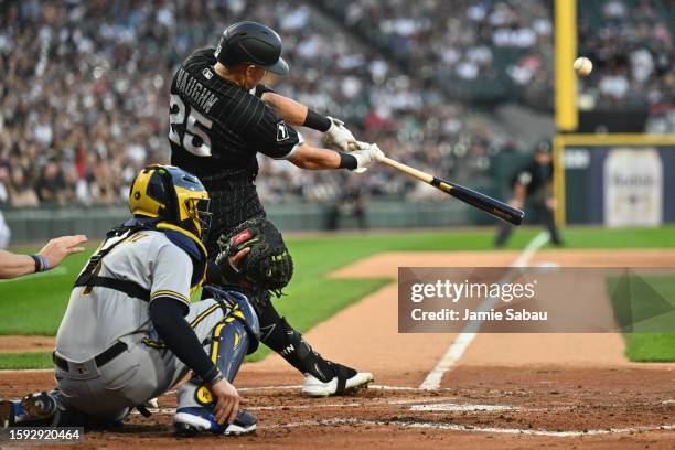Andrew Vaughn of the Chicago White Sox hits a single in the first inning against the Milwaukee Brewers at Guaranteed Rate Field on August 11, 2023 in...