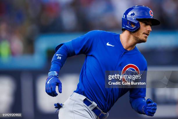 Cody Bellinger of the Chicago Cubs runs out a two-run home run in the first inning against the Toronto Blue Jays at Rogers Centre on August 11, 2023...