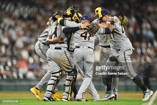 The Milwaukee Brewers celebrate after defeating the Chicago White Sox 7-6 in ten innings at Guaranteed Rate Field on August 11, 2023 in Chicago,...