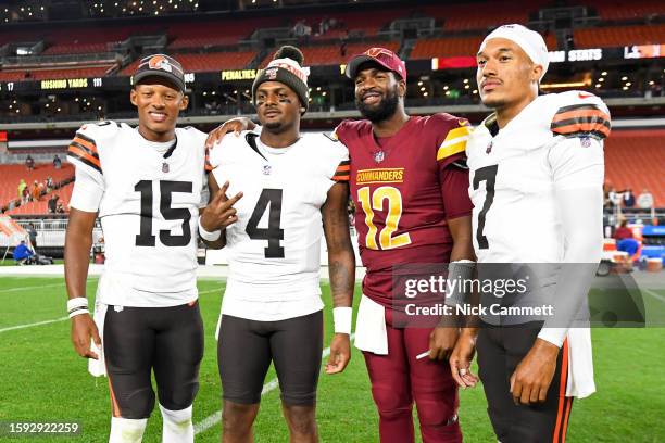 Joshua Dobbs, Deshaun Watson and Kellen Mond of the Cleveland Browns pose for a photo with Jacoby Brissett of the Washington Commanders after the...