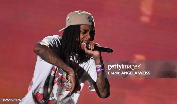 Rapper Wiz Khalifa performs during the Hip Hop 50 Live concert, marking the 50th anniversary of the birth of hip hop, at Yankee Stadium in the Bronx...