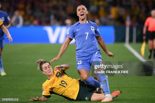 France's defender Sakina Karchaoui is tackled by Australia's midfielder Katrina Gorry during the Australia and New Zealand 2023 Women's World Cup...