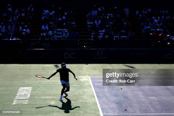 Taylor Fritz of the United States returns a shot to Andy Murray of Great Britain during Day 7 of the Mubadala Citi DC Open at Rock Creek Tennis...