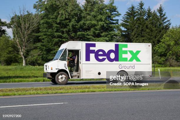 FedEx Ground delivery van travels on Pennsylvania Route 54 West.