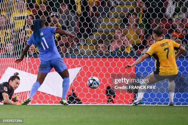 Australia's goalkeeper Mackenzie Arnold , France's forward Kadidiatou Diani and Australia's defender Stephanie Catley fight for the ball during the...