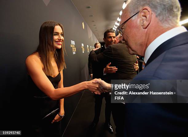 Cristiano Ronaldo's girlfriend Irina Shayk is greeted by Franz Beckenbaur during the red carpet arrivals at the FIFA Ballon d'Or Gala 2012 at the...
