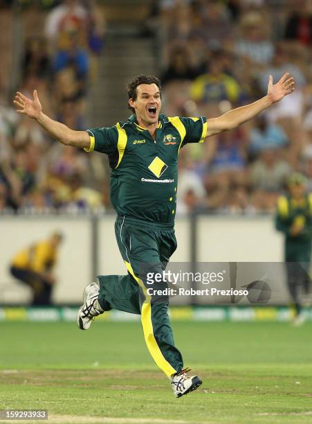 Clint McKay of Australia celebrates the wicket of Dinesh Chandimal of Sri Lanka during game one of the Commonwealth Bank One Day International series...