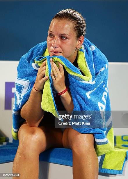 Dominika Cibulkova of Slovakia looks dejected after losing the women's final match against Agnieszka Radwanska of Poland during day six of the Sydney...