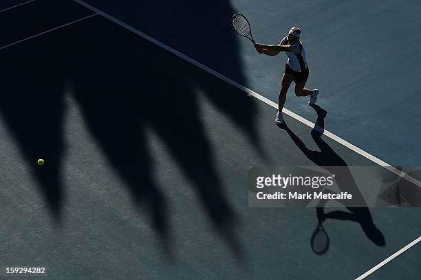 Kirsten Flipkens of Belgium plays a backhand in warm up before her semi final match against Mona Barthel of Germany during day eight of the Hobart...