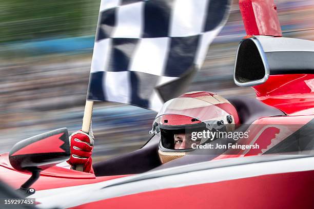 indy race car winner with checkered flag. - print finishing stock pictures, royalty-free photos & images