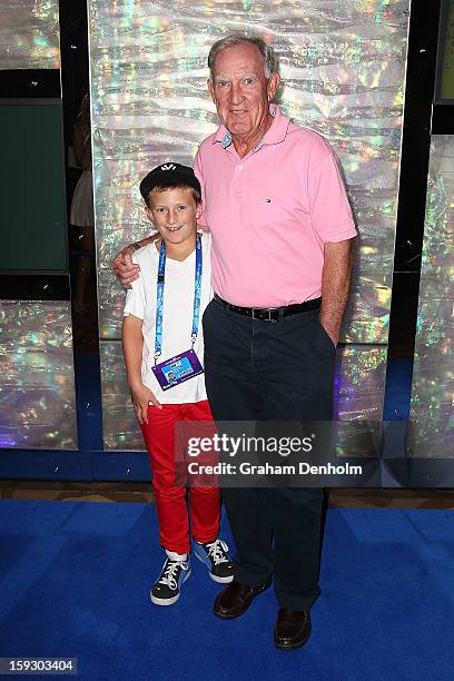 Tony Roche and his grandson arrive at the official Australian Open player party at the Grand Hyatt on January 11, 2013 in Melbourne, Australia.