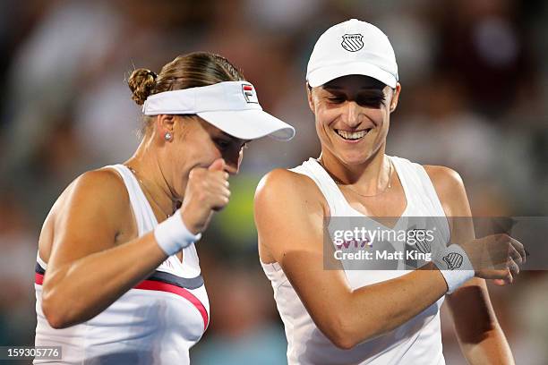 Nadia Petrova of Russia and Katarina Srebotnik of Slovakia celebrate winning a point in the women's doubles final match against Sara Errani and...