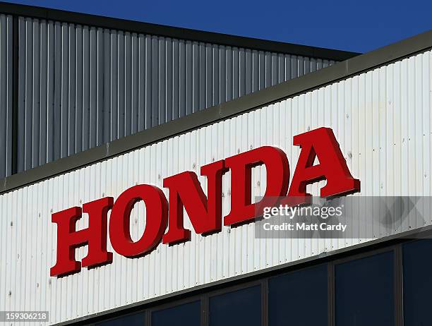The Honda logo is seen on the outside of a building at the Honda car assembly plant following the announcement that the firm is to axe 800 jobs on...
