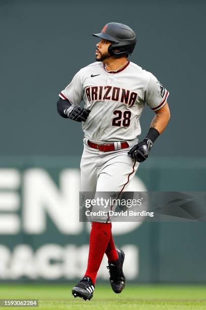 Tommy Pham of the Arizona Diamondbacks looks on after his at-bat against the Minnesota Twins in the first inning at Target Field on August 04, 2023...