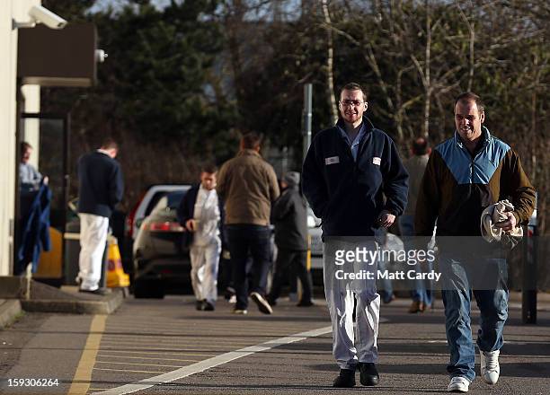 Honda workers leave their shift at the Honda car assembly plant following the announcement that the firm is to axe 800 jobs on January 11, 2013 in...