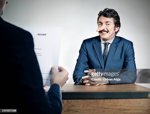 job interview - long nose stock pictures, royalty-free photos & images