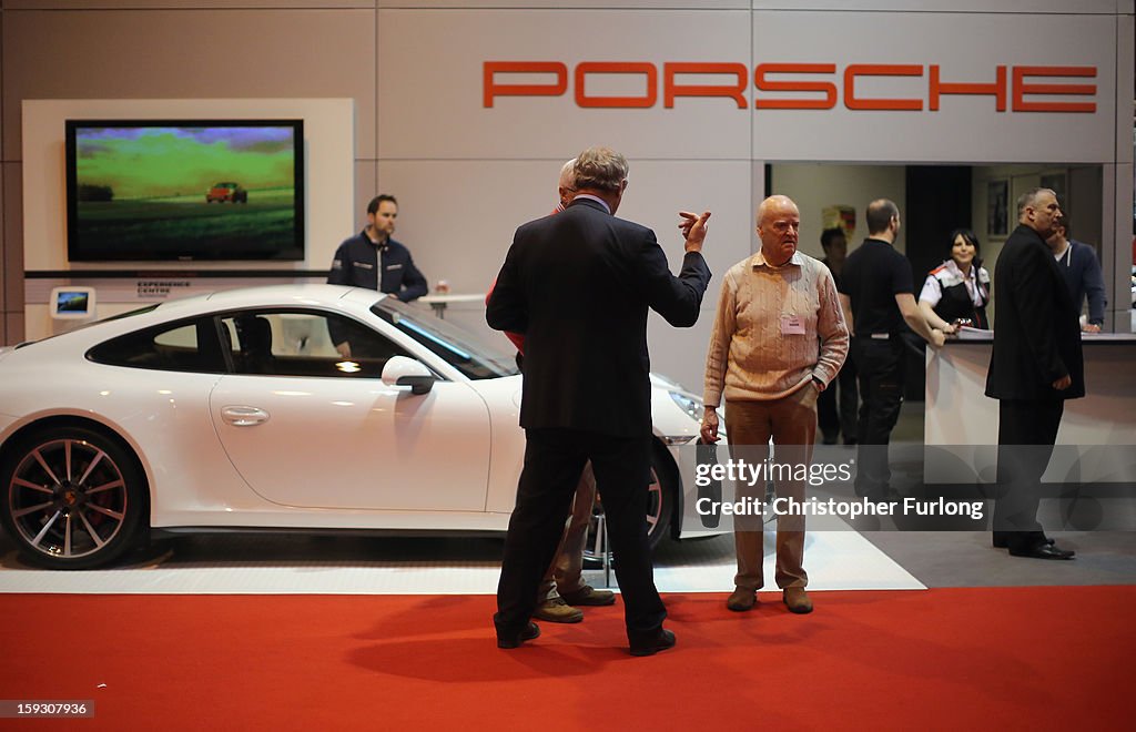 Racing And Car Enthusiasts Enjoy The Exhibits At The 2013 Autosport International Show