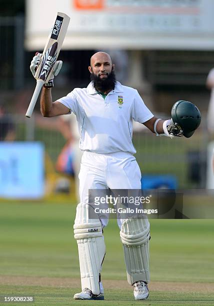 Hashim Amla of South Africa celebrates his century during day one of the second test match between South Africa and New Zealand at Axxess St Georges...