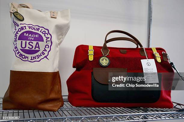 Commemorative hand bags are for sale at the Presidential Inaugural Committee's store near the intersection of 11th and F Streets NW January 11, 2013...