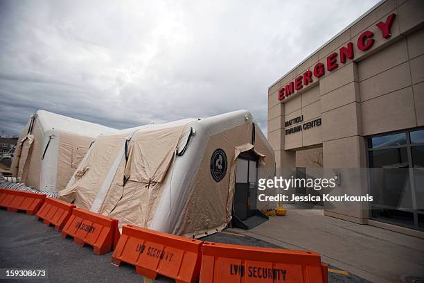 Mobile tents set up to handle the recent influx of flu cases stand outside the Lehigh Valley Health Network's main hospital campus January 11, 2013...