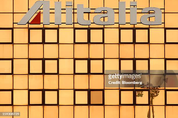 An Alitalia SpA logo sits on the company's offices at Fiumicino airport in Rome, Italy, on Friday, Jan. 11, 2013. Former Italian Prime Minister...