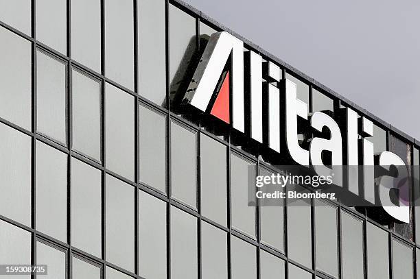 An Alitalia SpA logo sits on the company's offices at Fiumicino airport in Rome, Italy, on Friday, Jan. 11, 2013. Former Italian Prime Minister...